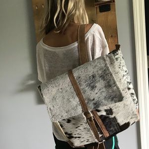 Hair on, leather Myra backpack Brand new with tags